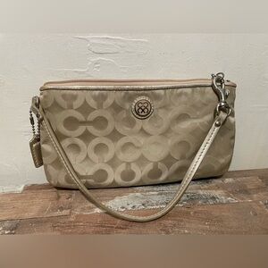 Coach metallic champagne wristlet